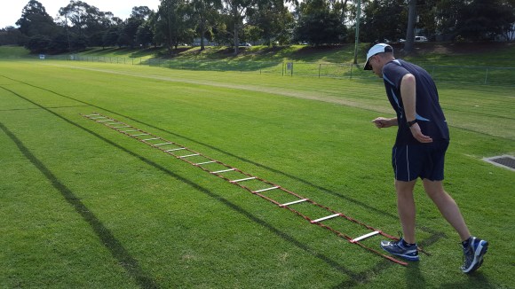 Getting ready to step through a quickfoot ladder