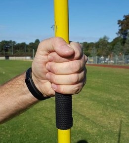 Javelin held incorrectly across the palm
