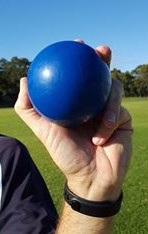 Grip with fingers incorrectly tucked under the shot