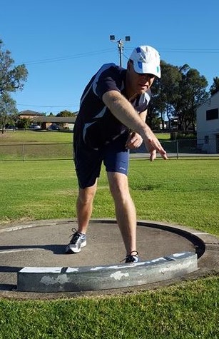 Shot putter releasing the shot from a low position