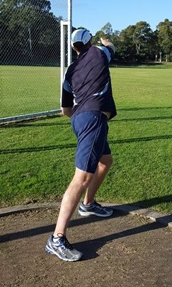 Discus thrower not moving feet enough.